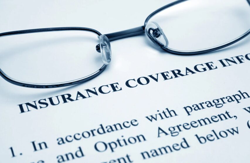 An insurance agent reviewing coverage options with a renter to choose the right renters insurance amount.