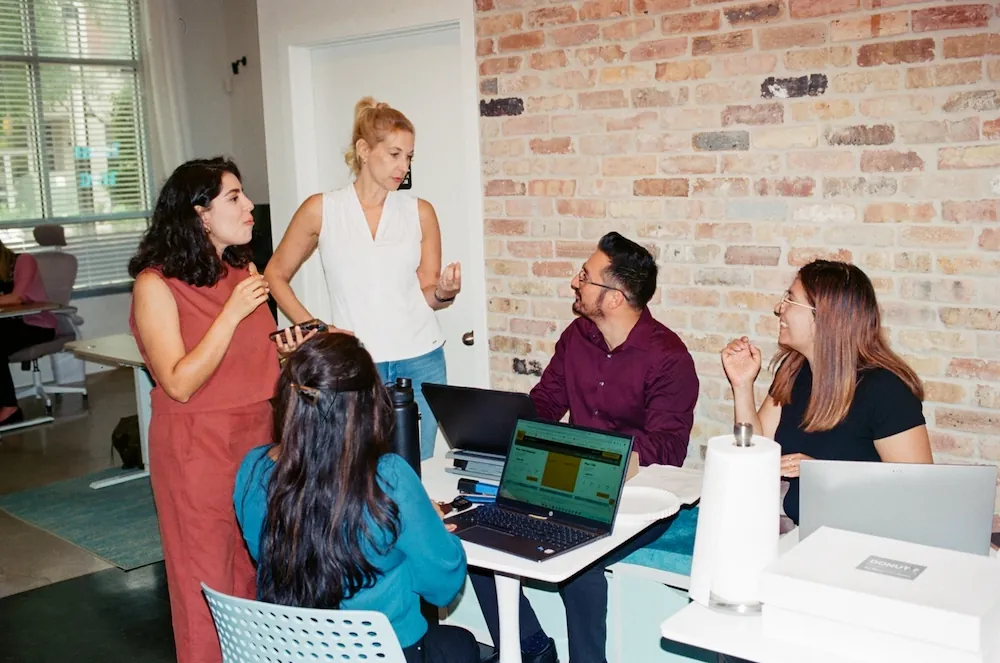 One Place Apartment Locators agents meeting with Austin renters