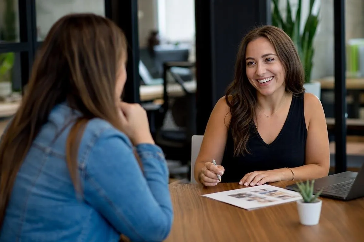 Austin apartment locator meeting with a renter to review listings